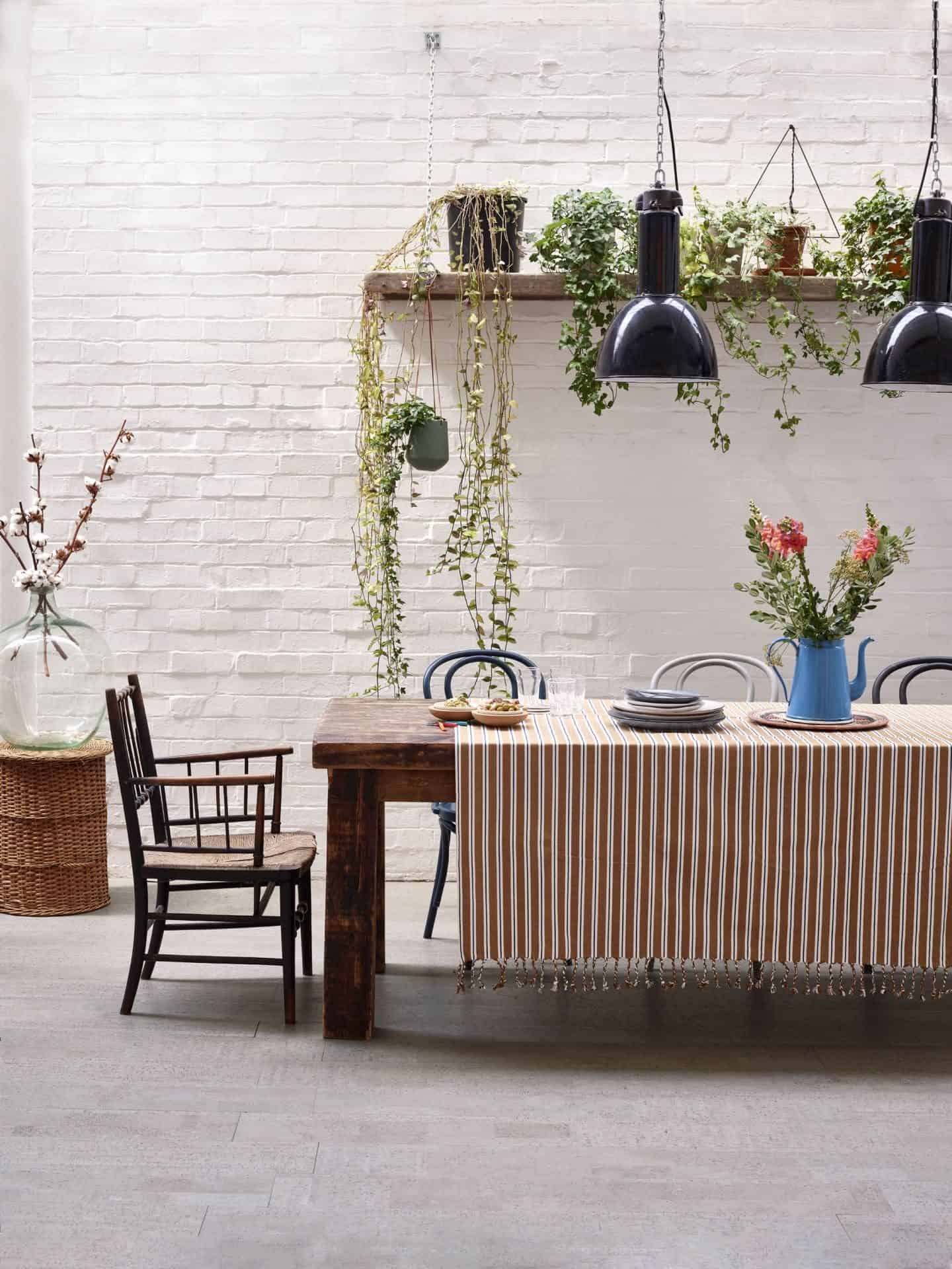 Bacana Grey waterproof cork flooring from The Colour Flooring Company used in a dining area