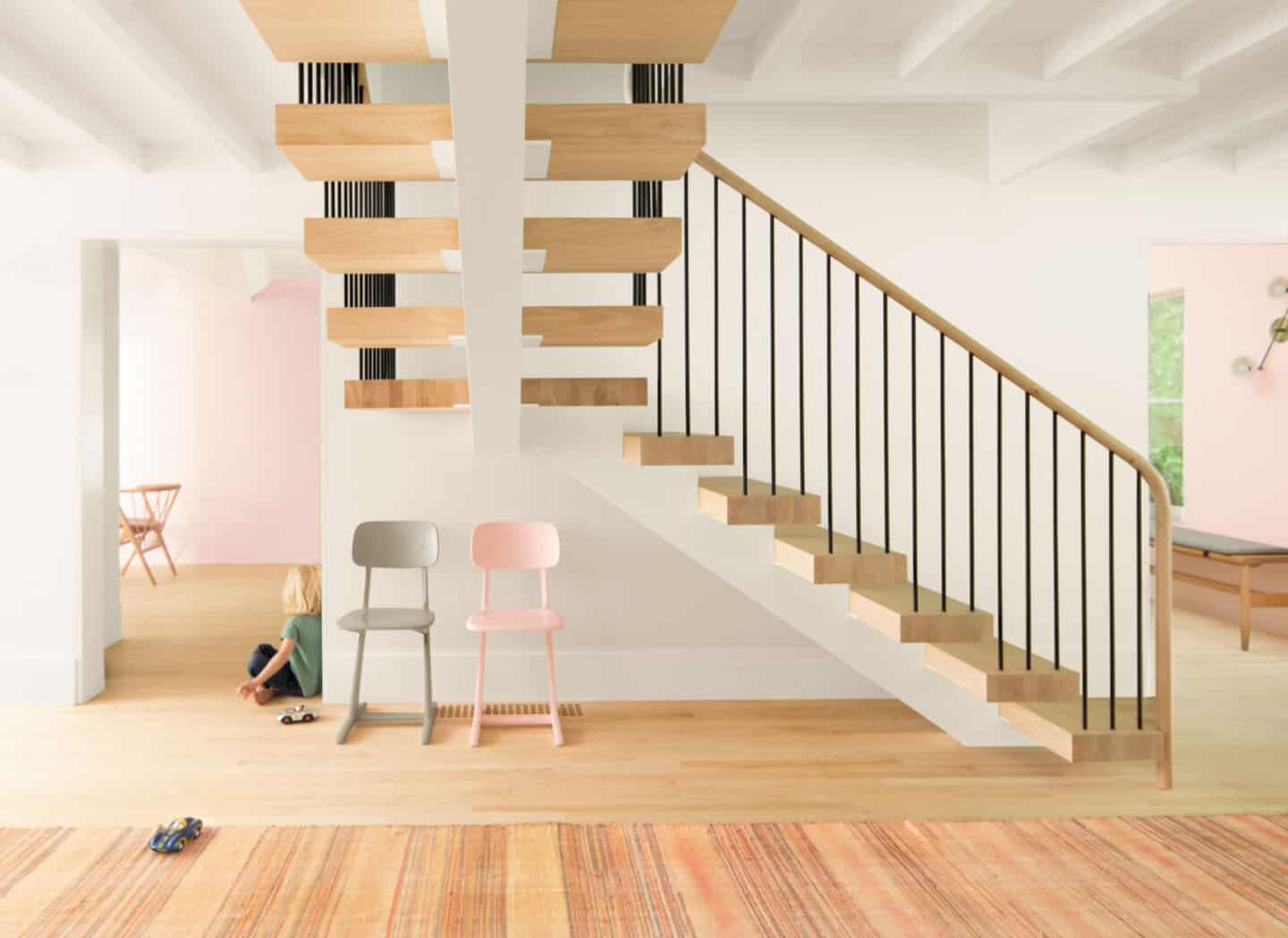 an open staircase with wooden risers and metal banistair