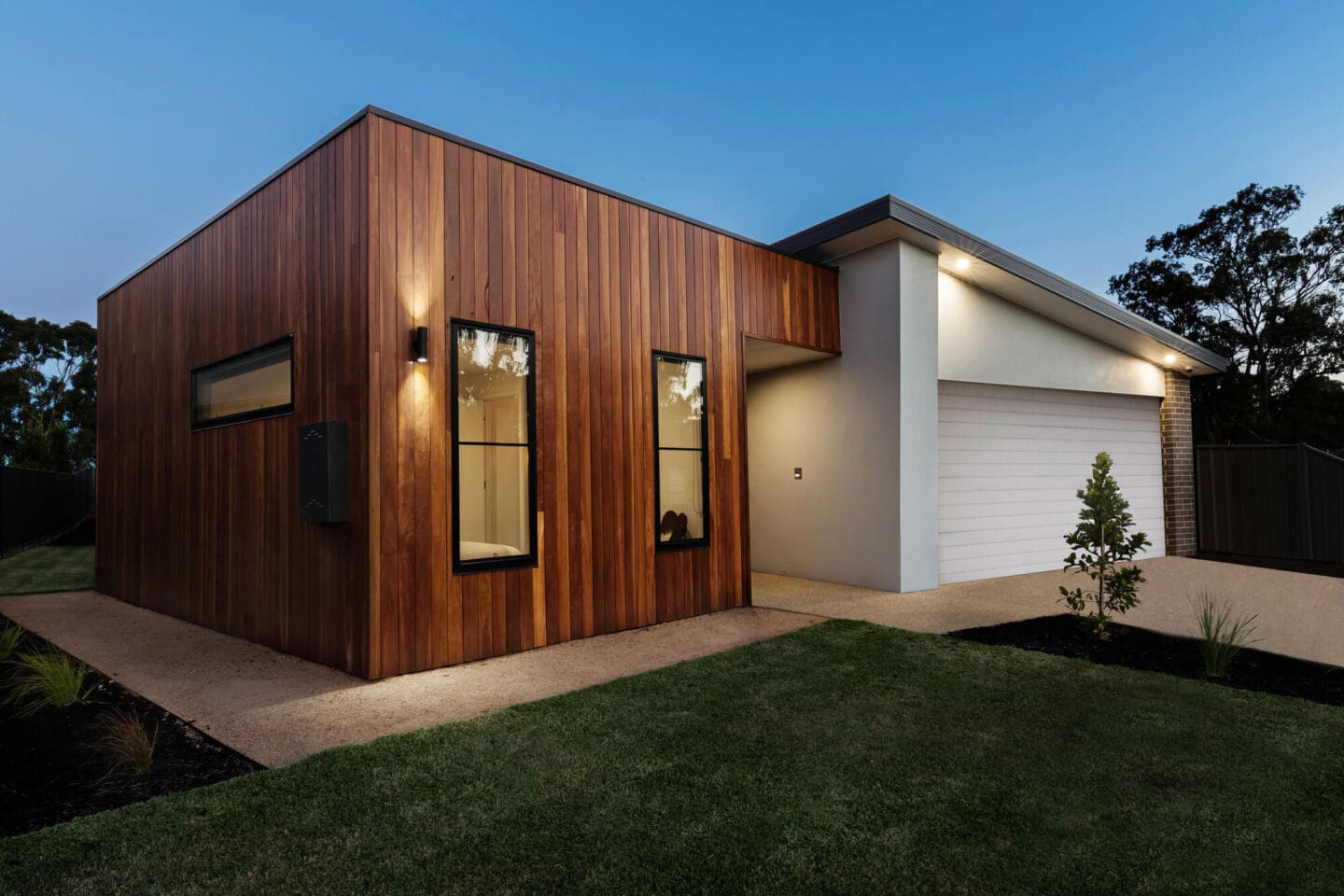 A modern home with exterior lighting