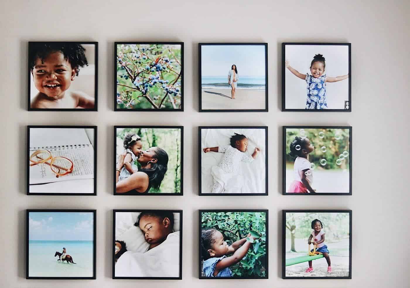 Photo tiles that stick to the wall to create a gallery wall of family photos