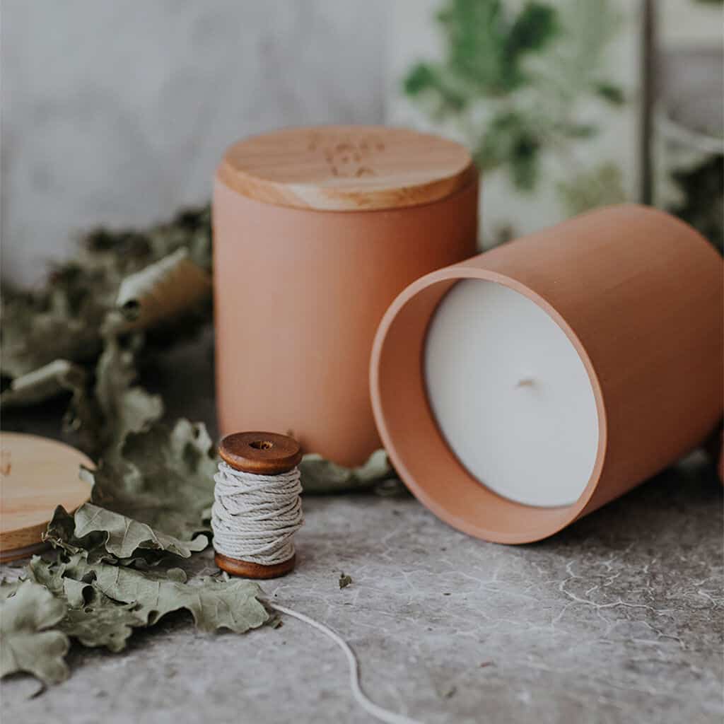 Textured Lives. Using texture in interiors to bring your home to life. Candles, leaves and twine on a stone surface